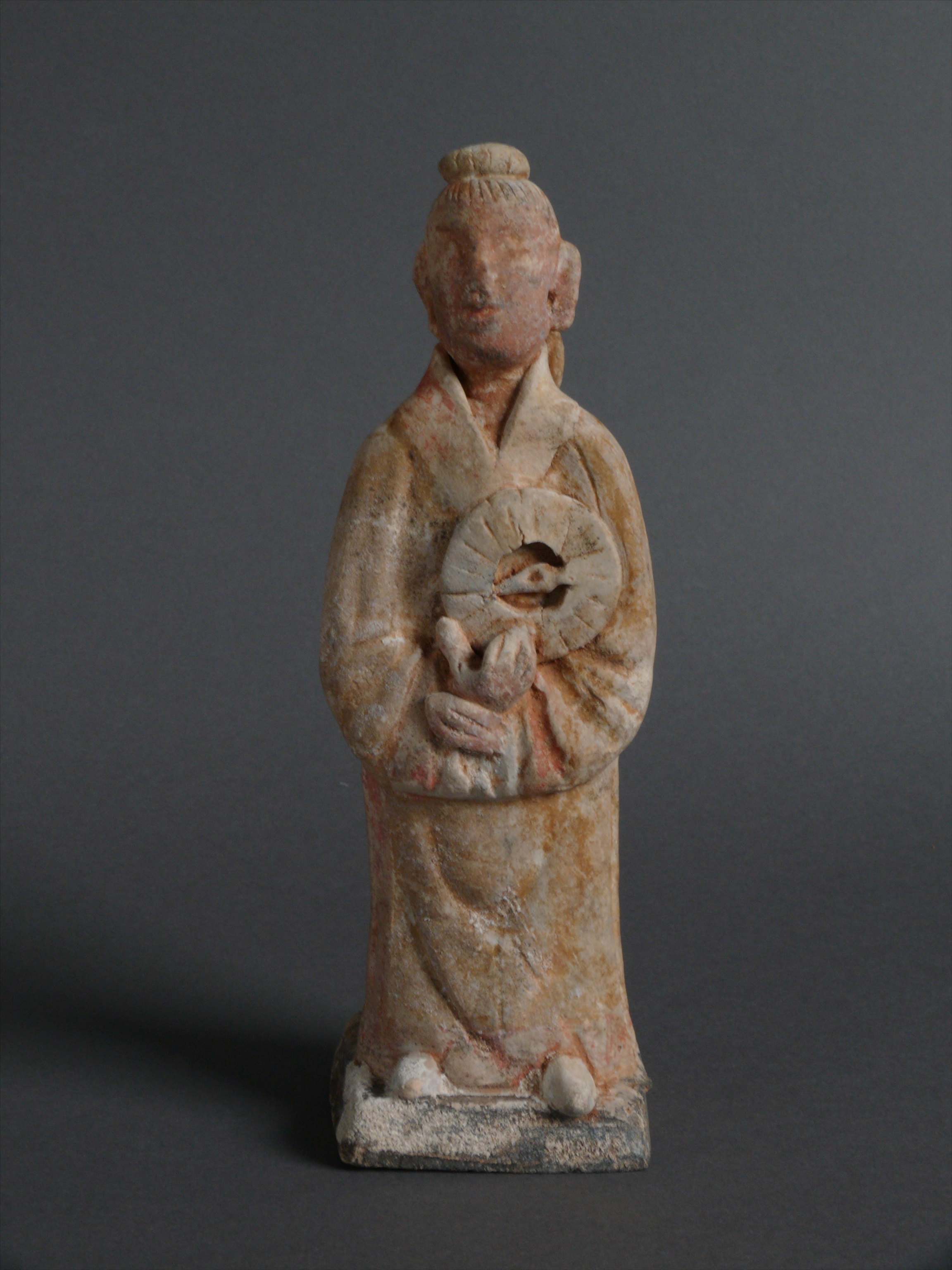Pottery figurine of a standing man holding a compass of Song Dynasty